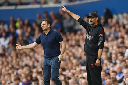 English Premier League Coaches standing together