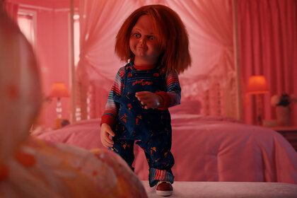 Chucky in a pink room