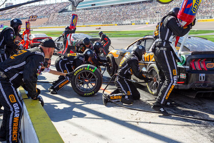 Pit Crew changing tires