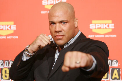 Kurt Angle points his fists to the camera while being photographed on the red carpet of Spike TV's 2006 Video Game Awards