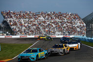 Denny Hamlin, Christopher Bell, and AJ Allmendinger, race during the NASCAR Cup Series Go Bowling at The Glen