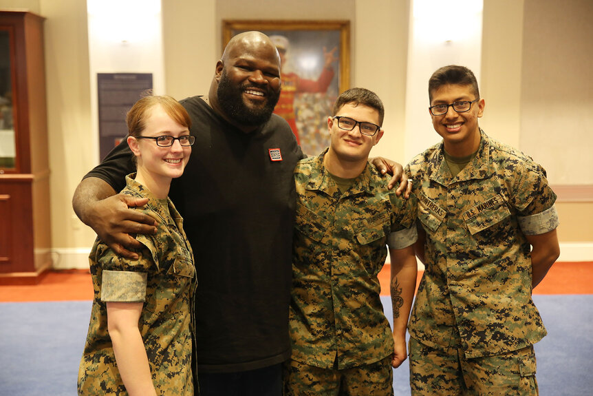 Mark Henry posing with Marines