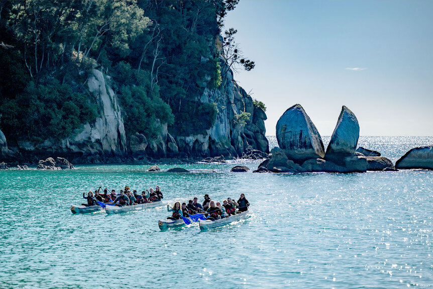 Race to Survive: New Zealand contestants row boats in Season 2, Episode 1.