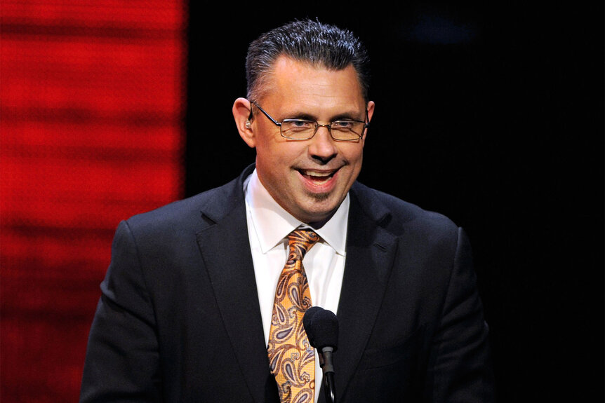 WWE commentator and host Michael Cole speaks at a news conference announcing the WWE Network