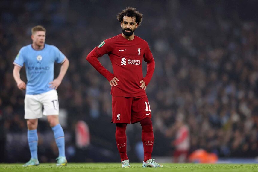 Mohamed Salah of Liverpool stands on the field during a game.